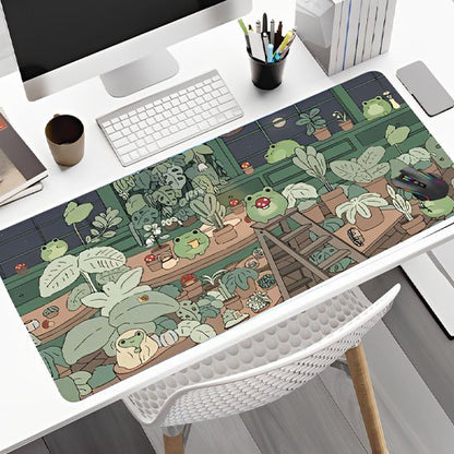 Sous main bureau motif vegetal avec grenouilles sur table bureau