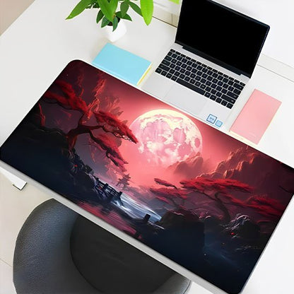 Sous main bureau ton rouge lune et bonsai devant un laptop