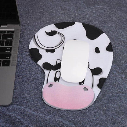 Tapis de souris avec souris blanche posee dessus