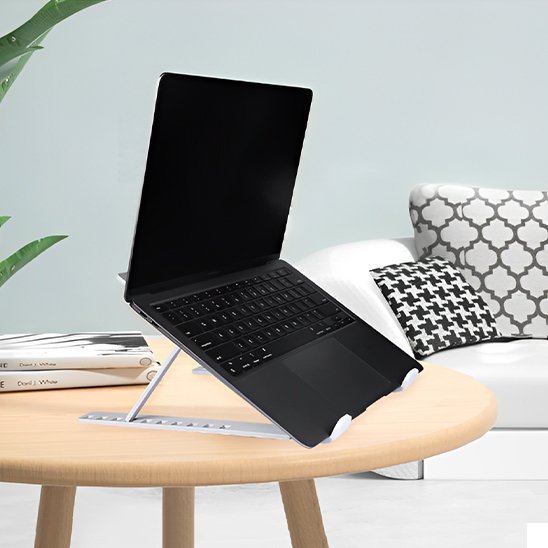 support ordinateur portable ergopro coueur blanche sur une table